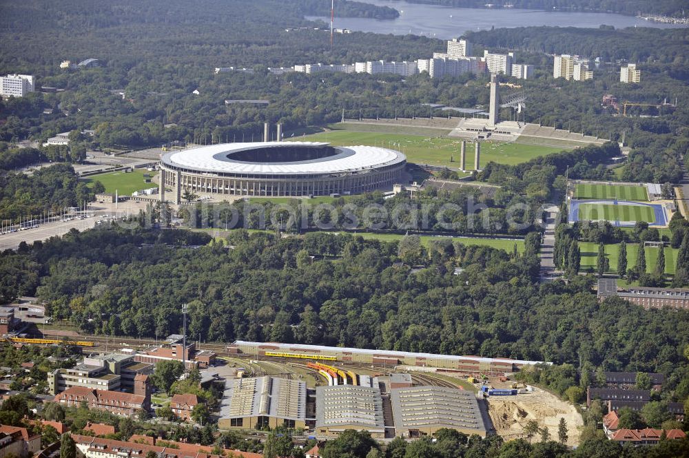 Berlin from the bird's eye view: Blick auf die BVG-Betriebswerkstatt Grunewald (vorn) am Berliner Olympiastadion. View of the BVG operation workshop Grunewald (front) at the Berlin Olympic Stadium.