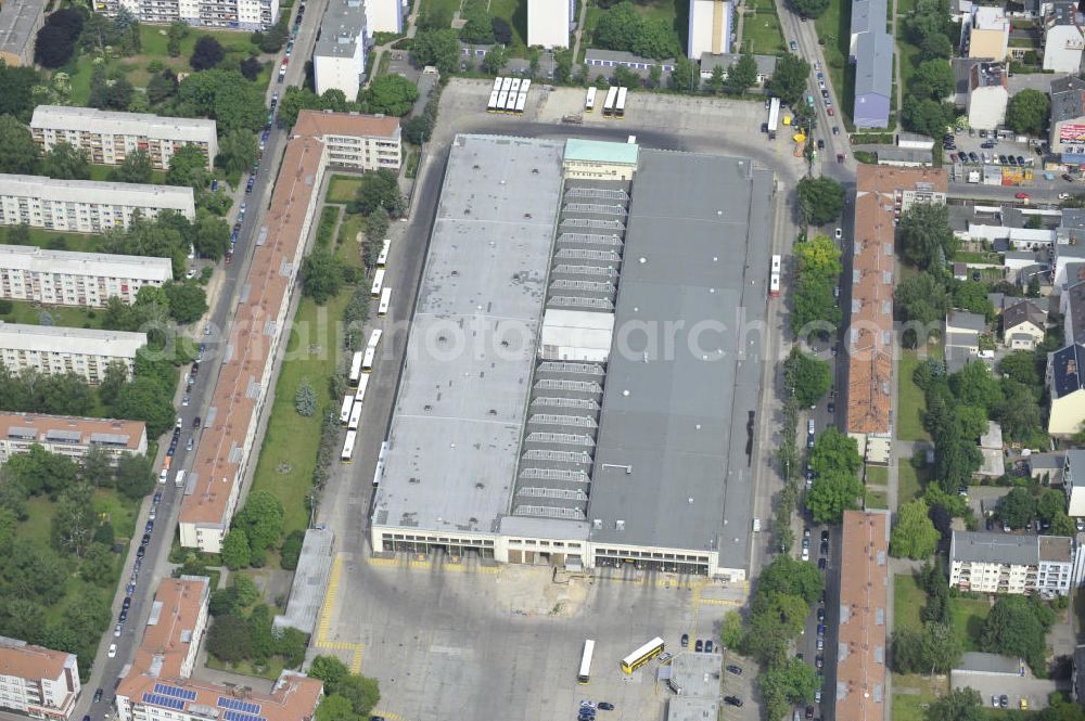 Berlin from above - Look at the BVG bus depot Britz in Grade street in Neukölln district in Berlin. It was formerly used as a tramway depot nd then reconstructed