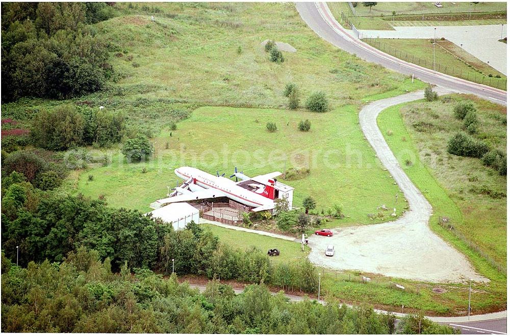 Aerial photograph Harbke - 27.07.2004 IL-18 der Interflug mit der Kennung DDR-STD Am 26. OCT 1986 außer Dienst gestellt und in SXF abgestellt. 1991 demontiert und auf dem LAndweg nach Harbke überführt. Seit 1992 als Café (60 Plätze) genutzt. Kann für Eheschließungen gebucht werden. Fany-Fly,Helmstedter Straße,39365 Harbke