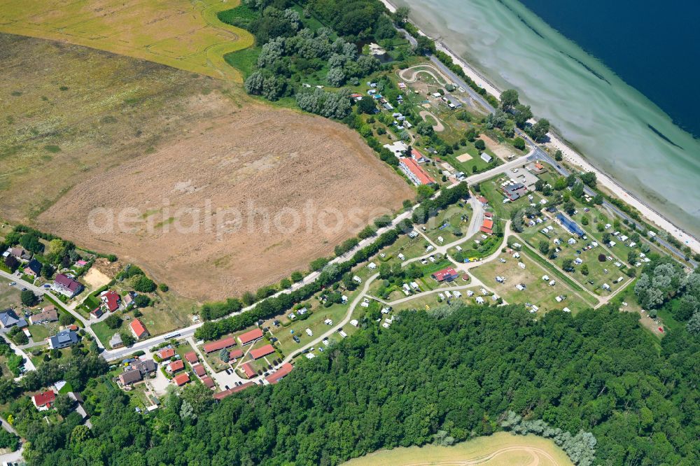 Niendorf from the bird's eye view: Campsite with caravans and tents in the coastal area Campingplatz Ostseequelle on street Strandstrasse in Niendorf at the baltic sea coast in the state Mecklenburg - Western Pomerania, Germany