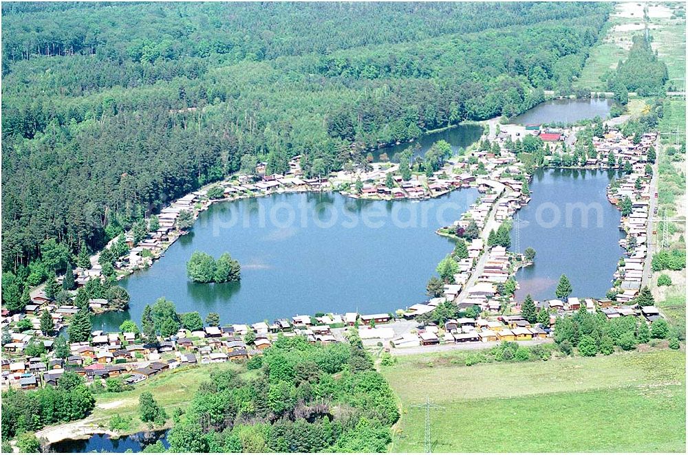 Aerial photograph Reiskirchen - 27.05.2004, Reiskirchen bei Homburg, Badesee Uwe Markgraf Webmaster: u.markgraf@gemeinde-reiskirchen.de Gemeinde Reiskirchen Allgemeine Information: info@gemeinde-reiskirchen.de Telefon : 06408 95900 Fax : 06408 959095 Postadresse : 35447 Reiskirchen Schulstrasse 17