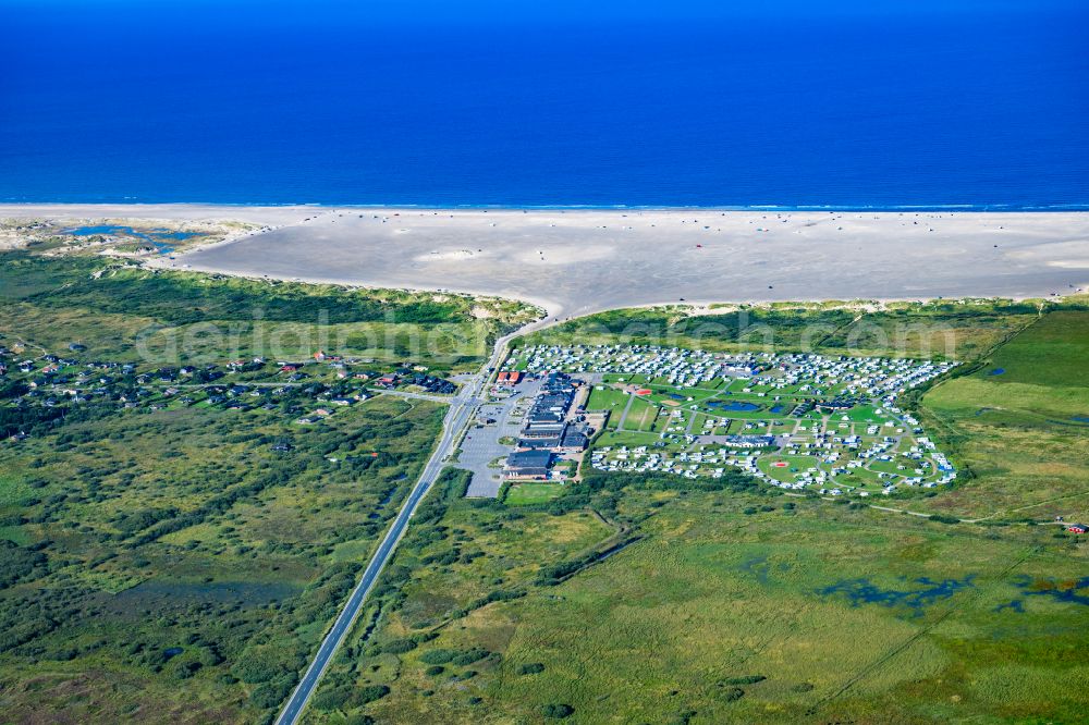 Römö from the bird's eye view: Campsite with caravans and tents in the coastal area First Camp Lakolk Strand - Roemoe on street Lakolk Butikscenter in Roemoe at the island Roemoe in Syddanmark, Denmark