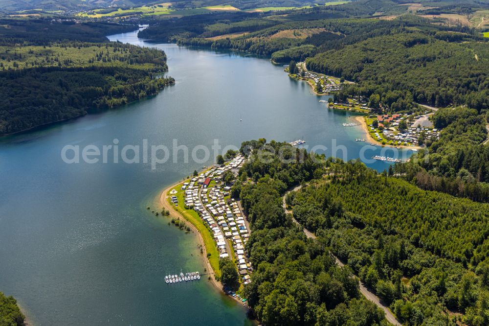 Sundern (Sauerland) from the bird's eye view: campsite Nordic Ferienpark with caravans and tents on the lake shore of Sorpesee in Sundern (Sauerland) at Sauerland in the state North Rhine-Westphalia, Germany