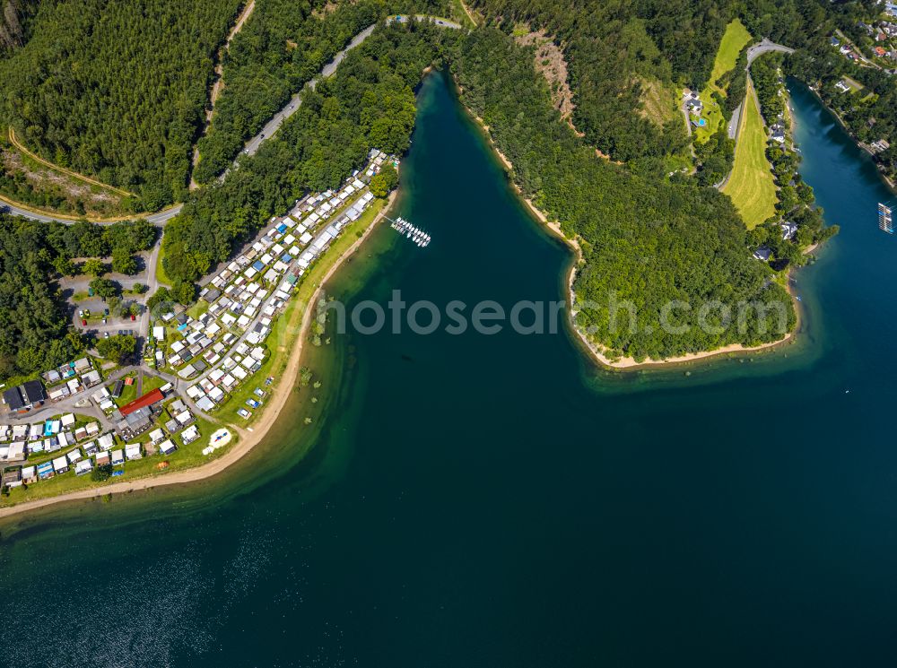 Sundern (Sauerland) from the bird's eye view: campsite Nordic Ferienpark with caravans and tents on the lake shore of Sorpesee in Sundern (Sauerland) at Sauerland in the state North Rhine-Westphalia, Germany