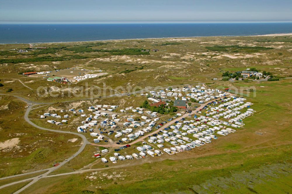 Aerial photograph Norderney - Blick auf den Campingplatz Um Ost auf der ostfriesischen Insel Norderney. Der Campingplatz liegt etwas 5 km vom Hafen entfernt und liegt am Rand des Nationalparks Niedersächsisches Wattenmeer. View of the campsite Um Ost on the East Frisian island of Norderney. The campsite is located 5 km from the port and is situated on the edge of National Park Wadden Sea. http://