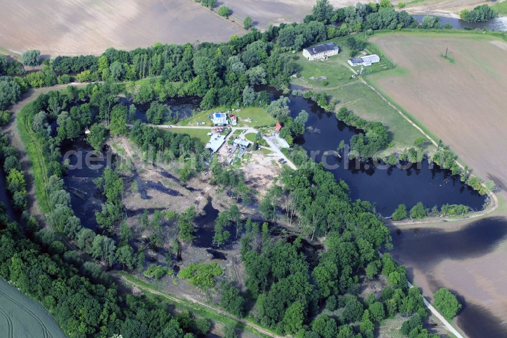 Aerial photograph Jena - A few days after the Saale flood 2013 at the campsite on Ostbad in Jena in Thuringia to see flood areas. The situation in the floodplain meadows under the Jenzig and the water flowing down the Gemdenbach led to a rapid flooding, the camping operation was temporarily suspended