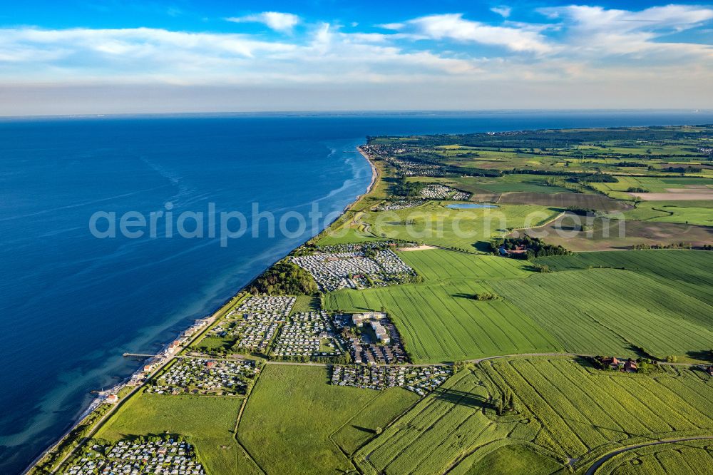 Aerial image Heringsdorf - Campsite with caravans and tents on the lake shore Suessau in Heringsdorf in the state Schleswig-Holstein, Germany