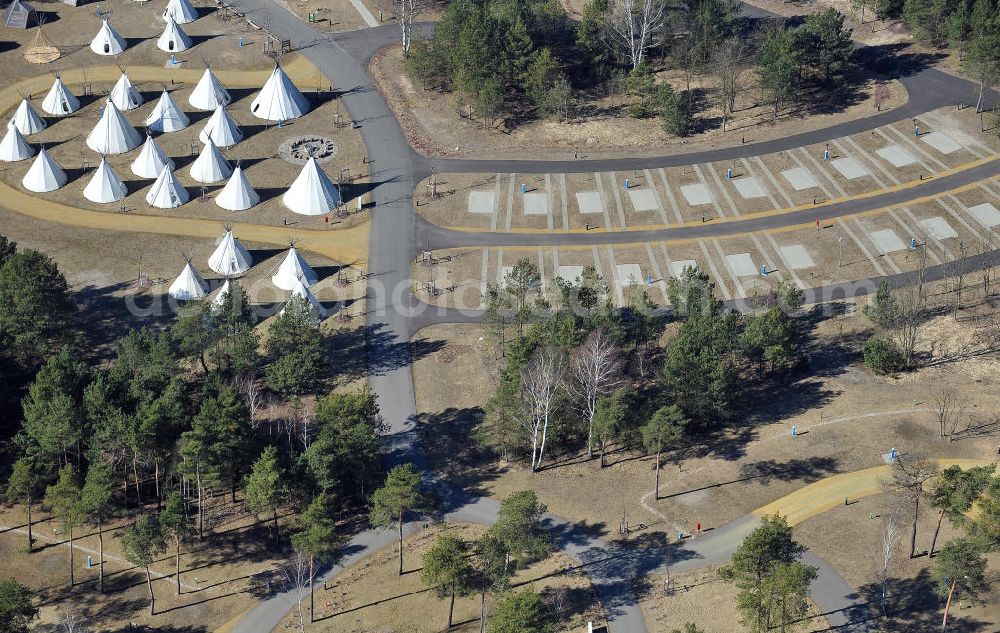 Halbe-Brand from the bird's eye view: Der Campingplatz am Tropical Islands mit Wohnmobilstellplätzen und mietbaren Tipi Zelten in Halbe-Brand. Der Platz erhielt vom ADAC die begehrte Campingplatz Auszeichnung. The campsite near by the Tropical Islands in Halbe-Brand.