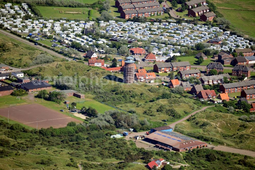 Aerial image Borkum - Camping with caravans along the course of the road Barbaraweg / Hindenburgstrasse with water tower and soccer field in Borkum in the state Lower Saxony