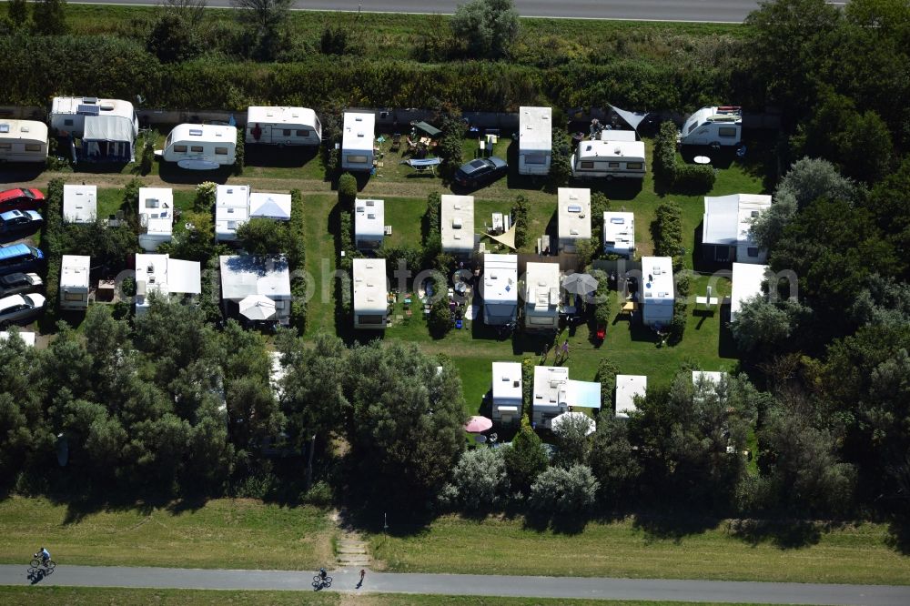 Aerial image Wustrow - Camping site with caravans and motorhomes in Wustrow in the state of Mecklenburg - Western Pomerania. The site is located on L21 road in the Southwest of the sea resort Wustrow