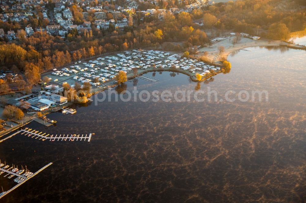 Düsseldorf from the bird's eye view: Sunrise at the camping with caravans and tents at the unterbacher lake in Duesseldorf in the state North Rhine-Westphalia