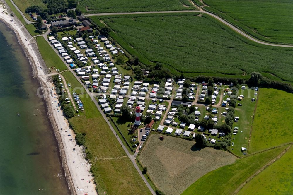 Falshöft from the bird's eye view: Camping with caravans and tents and lighthouse in Falshoeft in the state Schleswig-Holstein, Germany