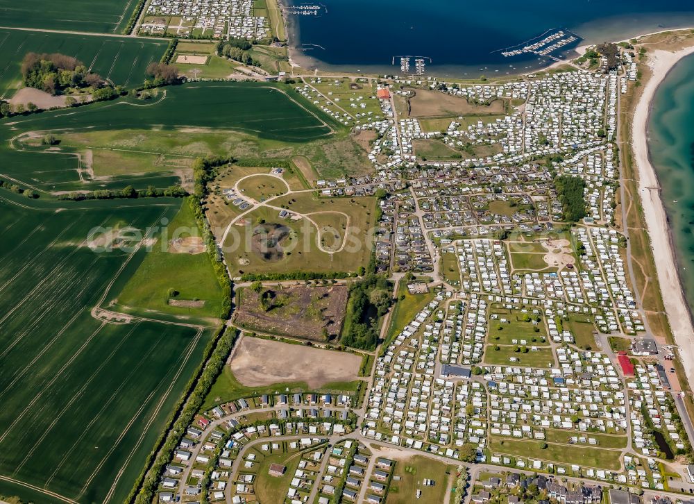 Neukirchen from the bird's eye view: Camping with caravans and tents on street Suetel-Strand in Neukirchen in the state Schleswig-Holstein, Germany