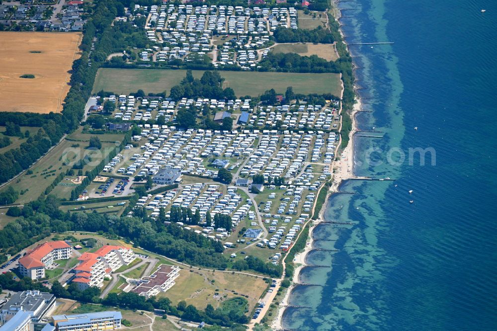 Aerial image Neustadt in Holstein - Camping with caravans and tents on baltic sea coast in Neustadt in Holstein in the state Schleswig-Holstein