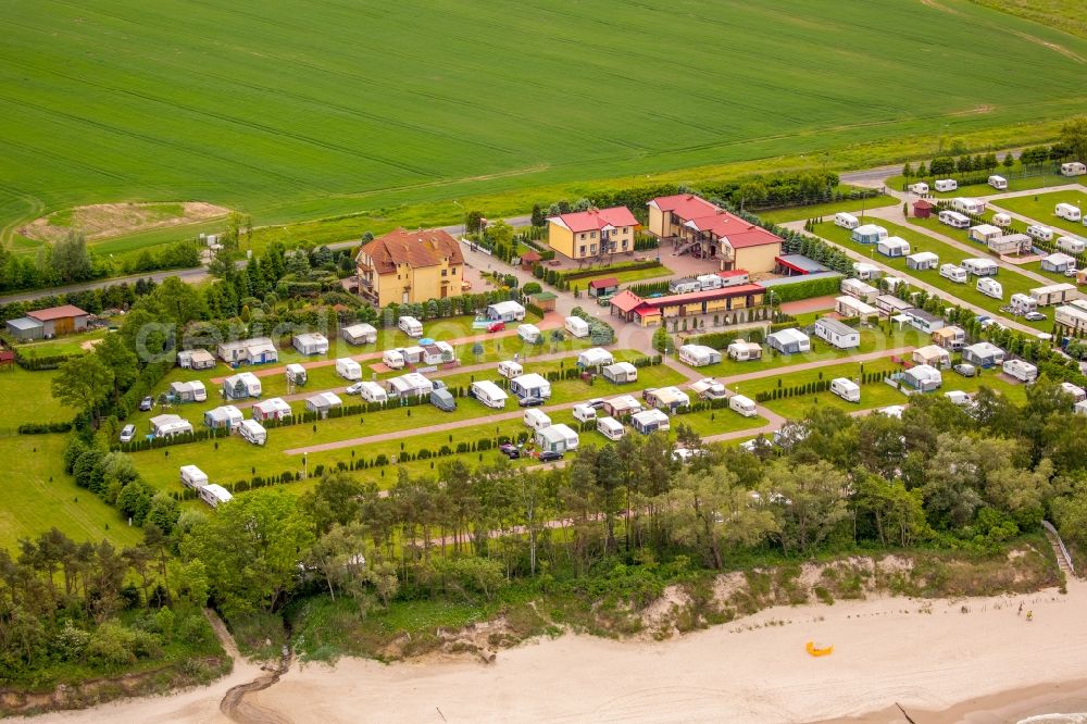 Sarbinowo from the bird's eye view: Camping with caravans and tents in Sarbinowo in West Pomerania, Poland