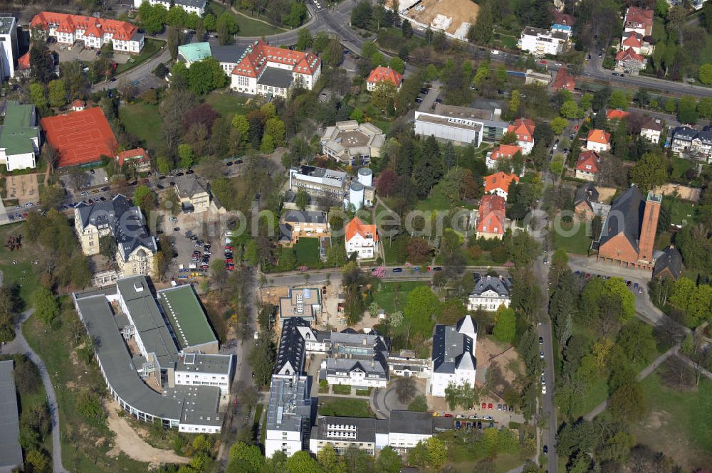 Aerial photograph Berlin Dahlem - Ansicht des Geländes der Freien Universität mit dem Fachbereich für Rechtswissenschaft, dem Fritz Haber Institut mit der Baustelle für ein neues Präzisionslabor, der Jesus Christus Kirche Dahlem sowie dem Harnack Haus. Campus of the Freie Universitaet / university Berlin with the faculcy of law, the Fritz Haber institute including the construction site for a new precision lab, the Jesus Christus church Dahlem and the Harnack Haus.