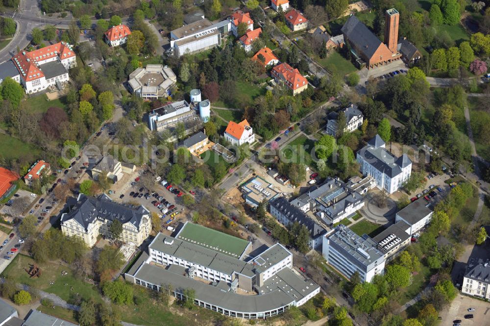 Berlin Dahlem from above - Ansicht des Geländes der Freien Universität mit dem Fachbereich für Rechtswissenschaft, dem Fritz Haber Institut mit der Baustelle für ein neues Präzisionslabor, der Jesus Christus Kirche Dahlem sowie dem Harnack Haus. Campus of the Freie Universitaet / university Berlin with the faculcy of law, the Fritz Haber institute including the construction site for a new precision lab, the Jesus Christus church Dahlem and the Harnack Haus.