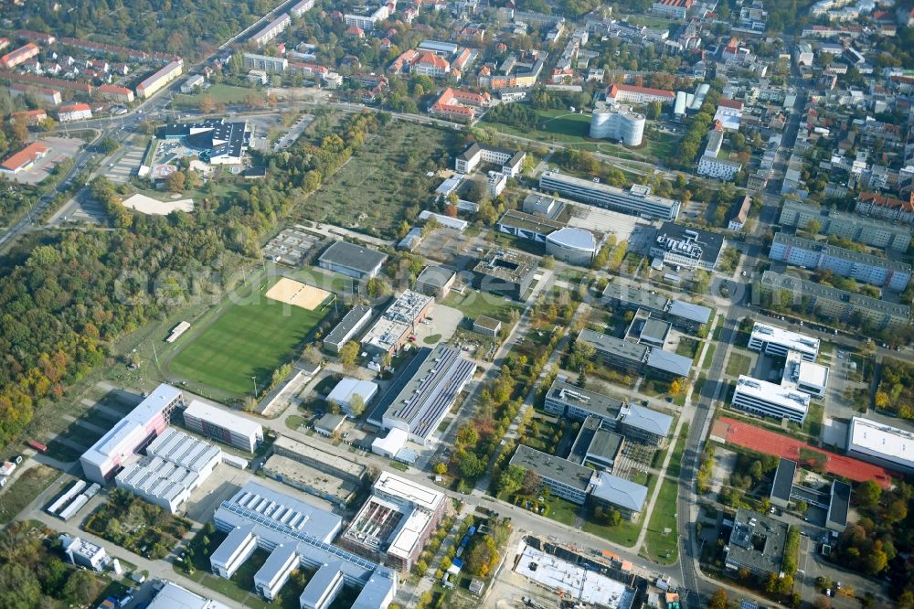 Cottbus from above - Campus building of the university Brandenburgische Technische Universitaet Cottbus-Senftenberg overlooking the construction sites for the construction of a research building and office complex and the startup center on Konrad-Wachsmann-Allee corner - Siemens-Halske-Ring in Cottbus in the state Brandenburg, Germany