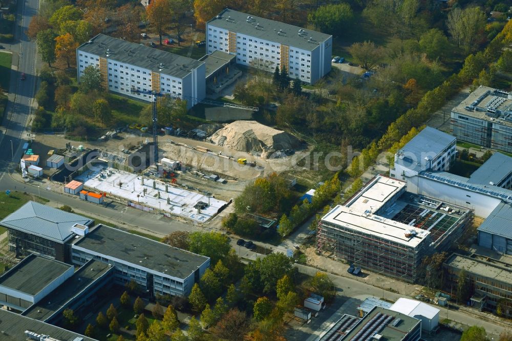 Aerial image Cottbus - Campus building of the university Brandenburgische Technische Universitaet Cottbus-Senftenberg overlooking the construction sites for the construction of a research building and office complex and the startup center on Konrad-Wachsmann-Allee corner - Siemens-Halske-Ring in Cottbus in the state Brandenburg, Germany