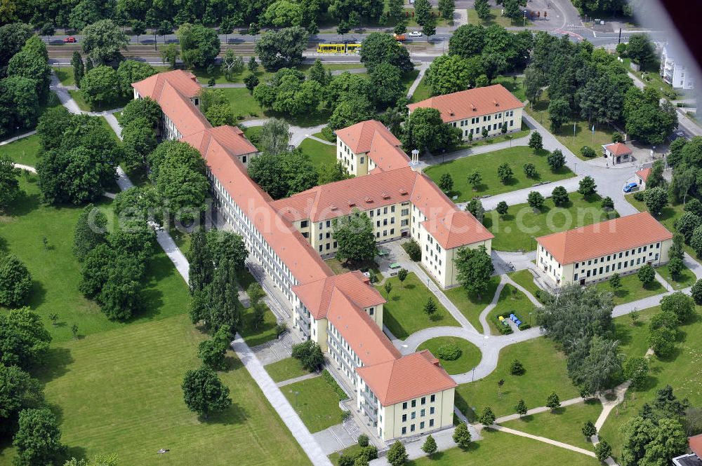 Magdeburg from above - Blick auf den Campus der Hochschule Magdeburg-Stendal. Der Campus zwischen Elbauenpark und dem Herrenkrug wurde zunächst von Wehrmacht und später sowjetischer Armee genutzt, bevor 1992 die Sanierung bestehender und Errichtung neuer Gebäude und schließlich der Einzug der Hochschule erfolgte. View of the campus of the University of Applied Science of Magdeburg-Stendal. The campus between Elbauenpark and Herrenkrug was first used by the Wehrmacht and later Soviet army before 1992, the rehabilitation of existing and construction of new buildings, and finally the arrival of the university took place.