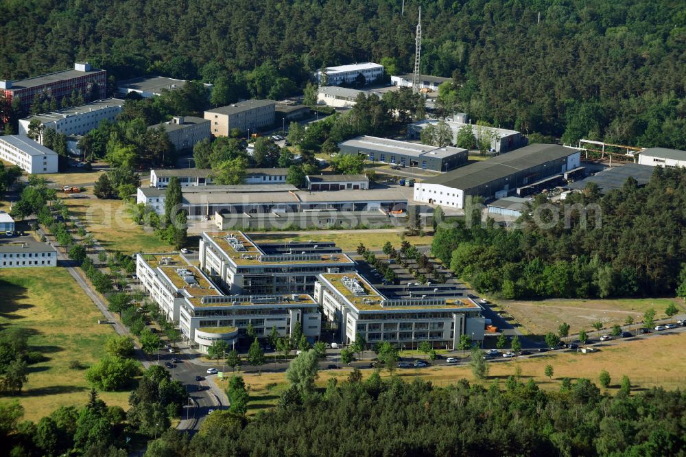 Aerial image Berlin - View of clouds surrounding the campus of commercial area Wuhlheide Innovation Park in Berlin - Koepenick