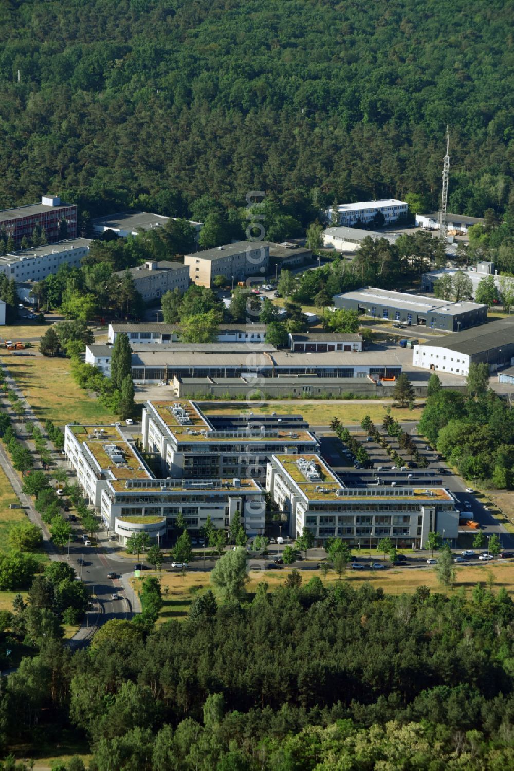 Aerial photograph Berlin - View of clouds surrounding the campus of commercial area Wuhlheide Innovation Park in Berlin - Koepenick