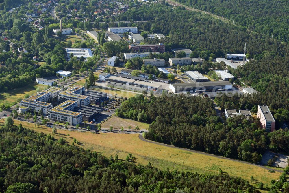 Berlin from the bird's eye view: View of clouds surrounding the campus of commercial area Wuhlheide Innovation Park in Berlin - Koepenick