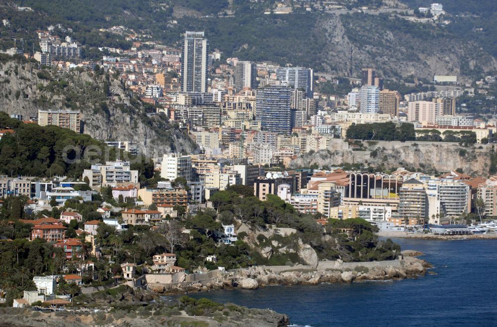 Aerial photograph MONACO - Blick von Cap-d' Ail auf den Stadtteil Fontvieille von Monaco. Fontvieille ist ein Stadtbezirk im Fürstentum Monaco an der Cote d' Azur. Er stellt den südlichsten Teil des Stadtstaates dar, der auf einer Fläche von 32,4 ha etwa 3300 Einwohner (dies entspricht einem Zehntel der Bevölkerung des Landes) hat.