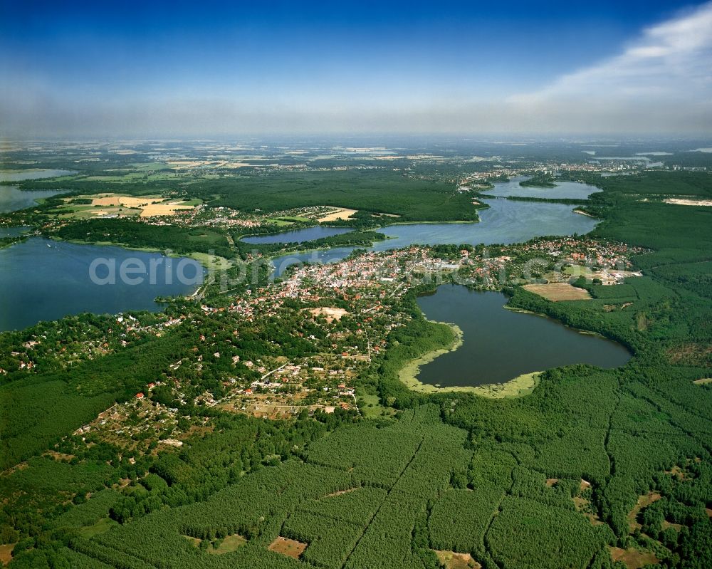 Caputh from above - The town of Caputh and its lake region in the state of Brandenburg. South of the town lies the small Caputh lake, to its west the large Lake Schwielow and to the East the lake Templin. All three belong to the forest and lake region of Potsdam