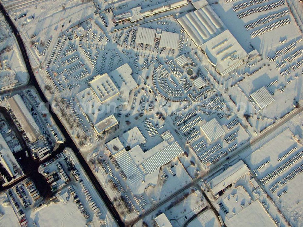 Aerial image Hoppegarten - Hoppegarten; Winterstimmung auf dem Gelände von Carena, einem der grössten Gebrauchtwagenparks Europas. Neuer Hoenower Weg 4, 15366 Dahlwitz-Hoppegarten bei Berlin, Tel.: 03342 / 363 660 (Herr Fleischer), Fax: 03342 / 363 111, e-Mail: carena@carena.de