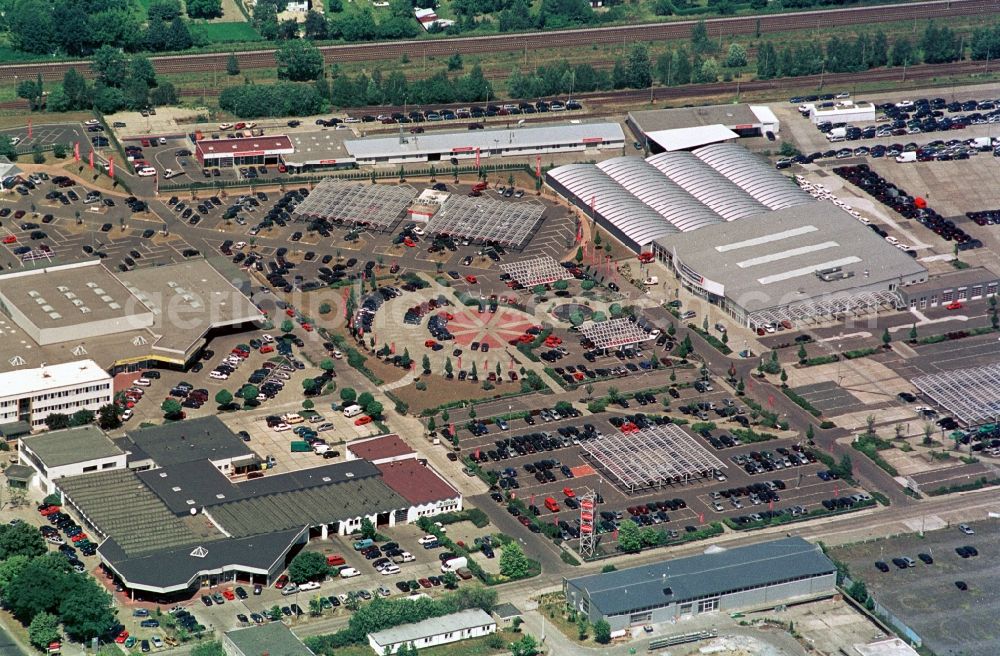 Aerial image Hoppegarten - The Carena car park Hoppegarten in the state of Brandenburg is one of the biggest used car markets in the region. On the grounds cars are bought, processed and resold. Services include car financing and a repair shop