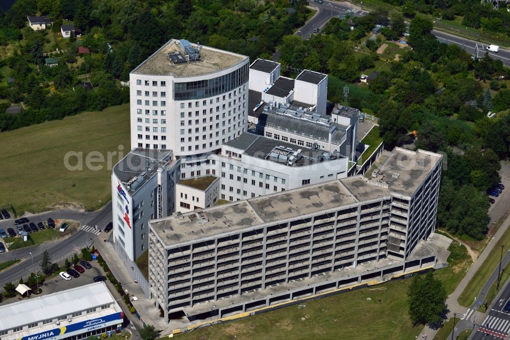 Warschau from above - Carolina Medical Center in the Mokotow district of Warsaw in Poland. The medical center is one of the biggest orthopaedic hospitals in Europe and is specialised in sports medicine. The facilities are located on the A2 motorway and include a parking building