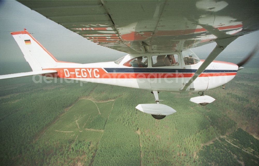 Aerial photograph Hohenstein - Light aircraft Cessna 172 D-EGYC Agency euroluftbild.de in flight over in Hohenstein in the state Brandenburg, Germany