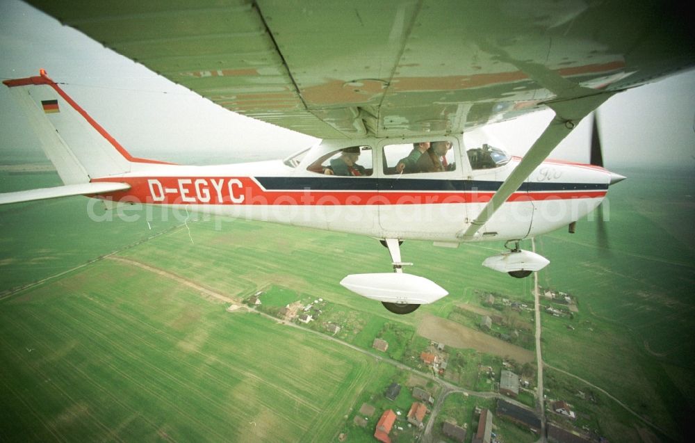 Aerial photograph Hohenstein - Light aircraft Cessna 172 D-EGYC Agency euroluftbild.de in flight over in Hohenstein in the state Brandenburg, Germany