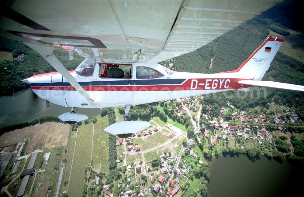 Aerial image Strausberg - Light aircraft Cessna 172 D-EGYC Agency euroluftbild.de in flight over Strausberg in the state Brandenburg, Germany