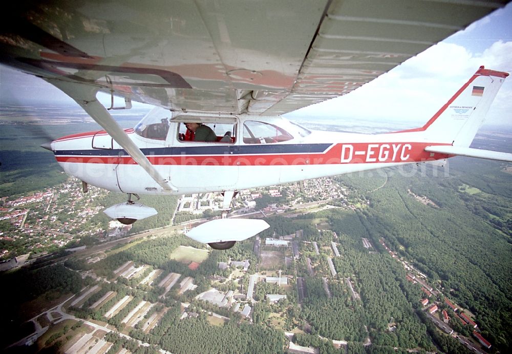 Strausberg from above - Light aircraft Cessna 172 D-EGYC Agency euroluftbild.de in flight over Strausberg in the state Brandenburg, Germany