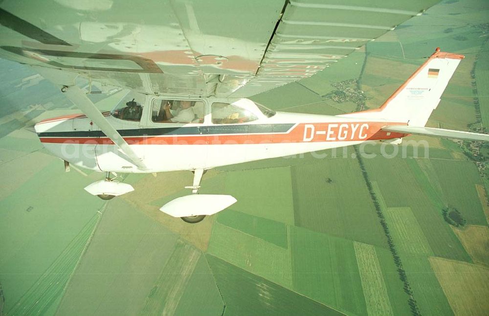 Brand / BRB from above - Cessna 172 D-EGYC bei einem Luftbildflug über dem Bereich Brand in Brandenburg