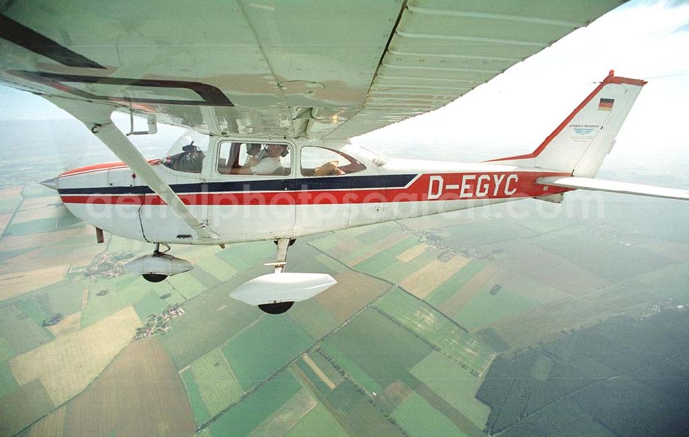 Aerial photograph Brand / BRB - Cessna 172 D-EGYC bei einem Luftbildflug über dem Bereich Brand in Brandenburg