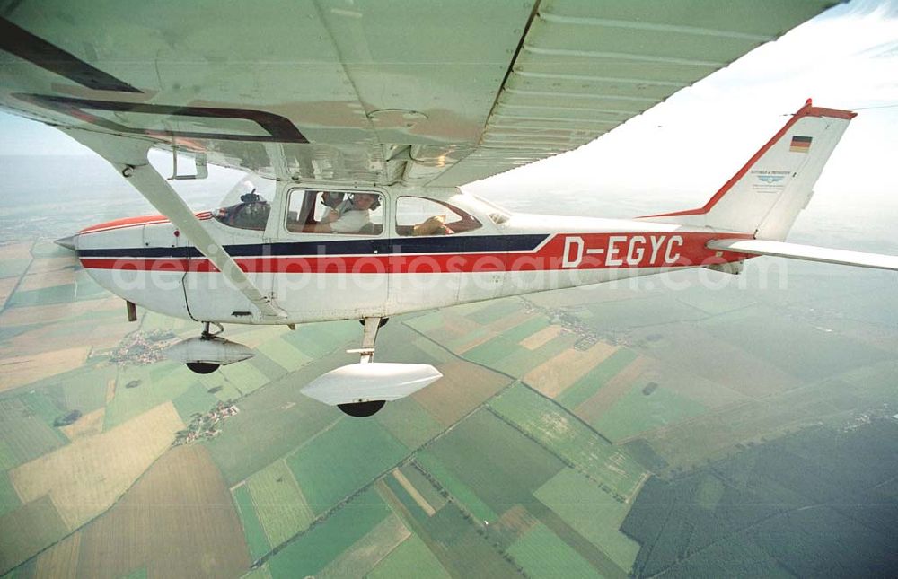 Brand / BRB from above - Cessna 172 D-EGYC bei einem Luftbildflug über dem Bereich Brand in Brandenburg