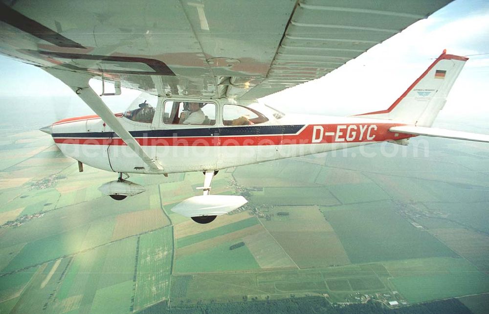 Aerial photograph Brand / BRB - Cessna 172 D-EGYC bei einem Luftbildflug über dem Bereich Brand in Brandenburg