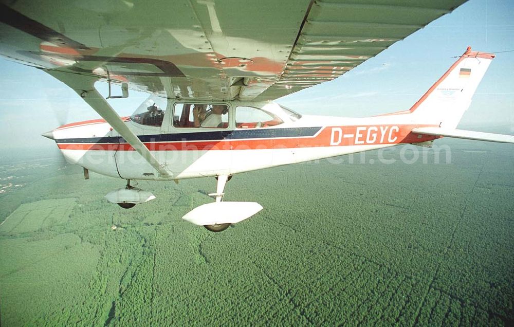 Aerial photograph Brand / BRB - Cessna 172 D-EGYC bei einem Luftbildflug über dem Bereich Brand in Brandenburg