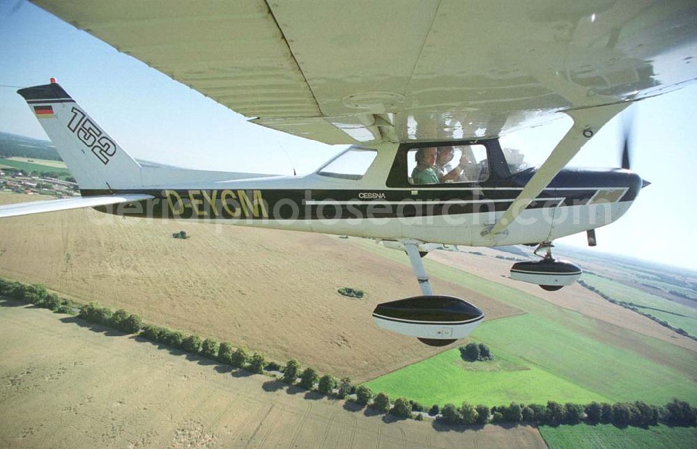 Aerial image Strausberg - Cessna 152 der Flugschule PEGASUS Strausberg im Abflug vom Flugplatz Strausberg.