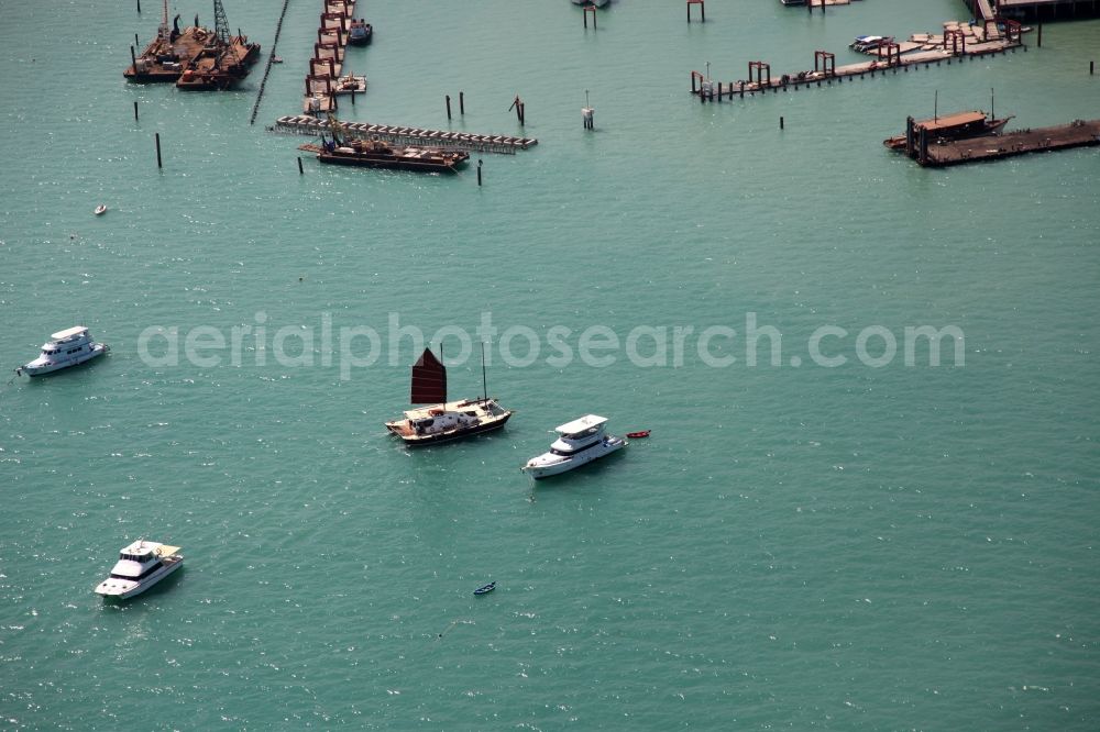 Chalong from above - In Chalong bay outside the city Chalong on Phuket Island in Thailand is the Chalong Pier with berths for boats and yachts