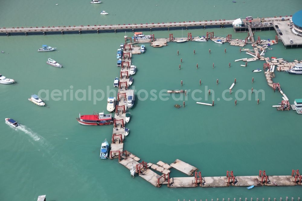 Chalong from above - In Chalong bay outside the city Chalong on Phuket Island in Thailand is the Chalong Pier with berths for boats and yachts