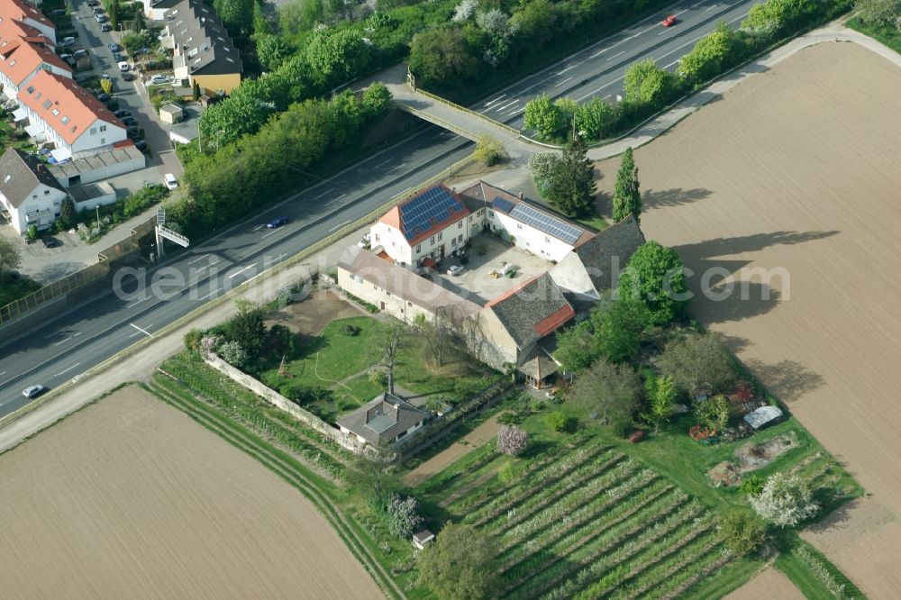 Mainz from the bird's eye view: Chaussee House in the Marienborn district of Mainz in the state of Rhineland-Palatinate. The Western district of Mainz is located on the federal motorway A63 and is still characterised by agriculture and agricultural land. Today, there are several residential high-rises on site. The estate is located on the federal motorway and is home to Amorella cherries