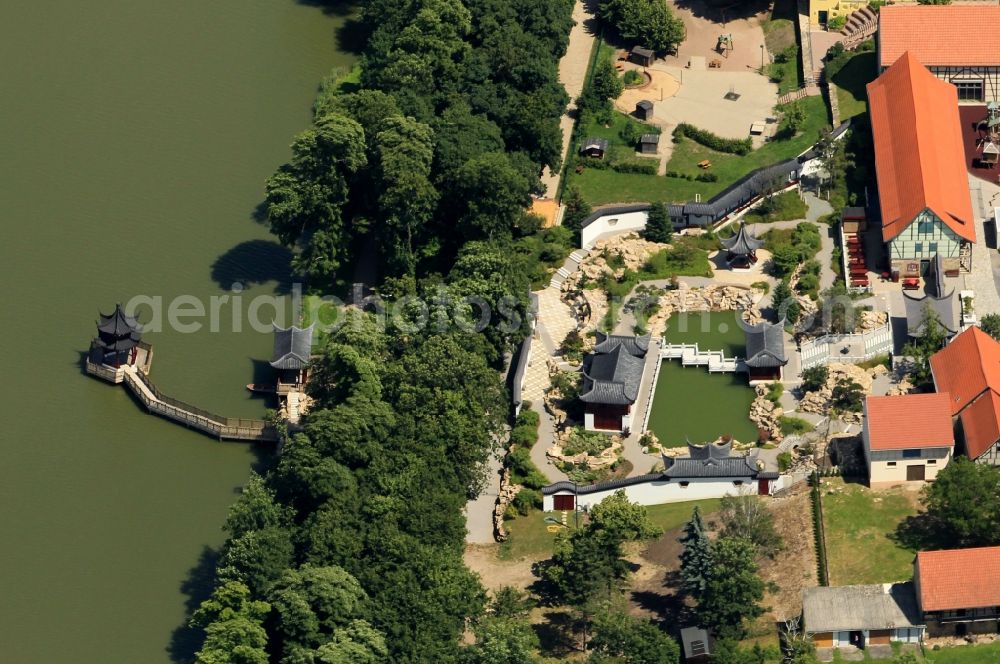 Aerial image Weißensee - At the Gondelteich Weissensee in Thuringia emerged in recent years, a Chinese garden. The Chinese Garden connects directly to the old town and was designed as part of the State Garden Show. Several buildings on the Chinese model as the gateway to the foresight of the Pavillion of scented water and lake-pavilion form the structural framework for the garden landscape. Typical plants and garden elements round off the picture