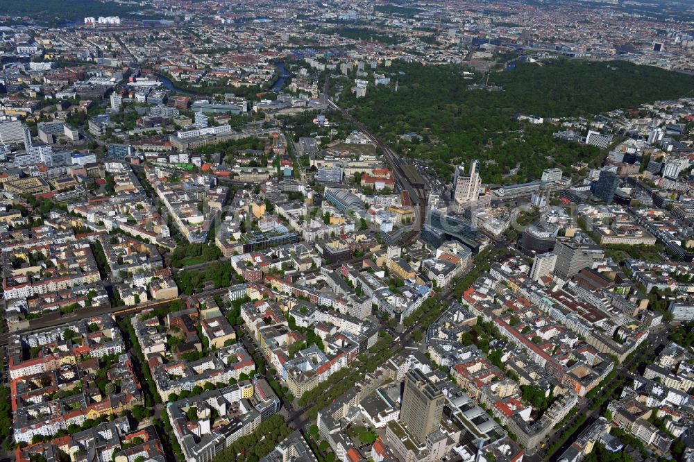 Aerial image Berlin - Im Hintergrund ist das Hochhaus Steglitzer Kreisel an der Schlossstraße zu erkennen. With the Kurfuerstendamm Lietzenburger Street and Kant road crossing three major shopping streets the district of Charlottenburg-Wilmersdorf of Berlin. Situated in the attractive residential and business location in the City West, there are numerous attractions and shopping. On Breitscheidplatz is consistent with the Kaiser-Wilhlem Memorial Church, a landmark of the capital. With the Zoo, the Savigny Platz and the Los Angeles Platz area is beautiful green and recreational facilities. Shopping centers such as the bikini-house, the Europa Center, the Kuhdam??-Eck, the Neues Kranzler Eck and the style works are popular destinations for shoppers. The Zoofenster with the luxury Waldorf Astoria Hotel on Breitscheidplatz and the high-rise at getting on in years Kudamm Karree are the tallest buildings in the downtown area