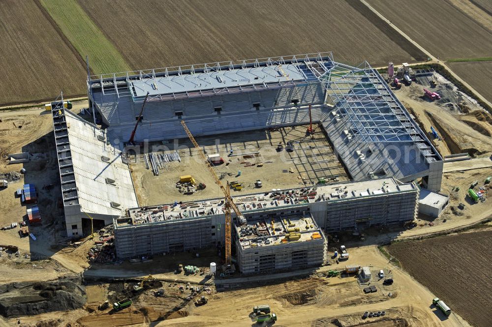 Mainz from the bird's eye view: Blick auf den Neubau der Coface Arena im Stadtteil Bretzenheim. Das neue Stadion des Fußballklubs FSV Mainz 05 soll 33.500 Plätze bieten und zu Beginn des Jahres 2011 fertiggestellt werden. Bauherr und Eigentümer ist die Grundstücksverwaltungsgesellschaft (GVG) der Stadt Mainz. Ausführende Baufirma ist die BAM Deutschland AG. View of the new Coface Arena in the district Bretzenheim. The new stadium of the football club FSV Mainz 05 will provide 33,500 seats and will be completed at the beginning of 2011. Builder and owner of the property is the real estate management society of the city of Mainz (GVG).