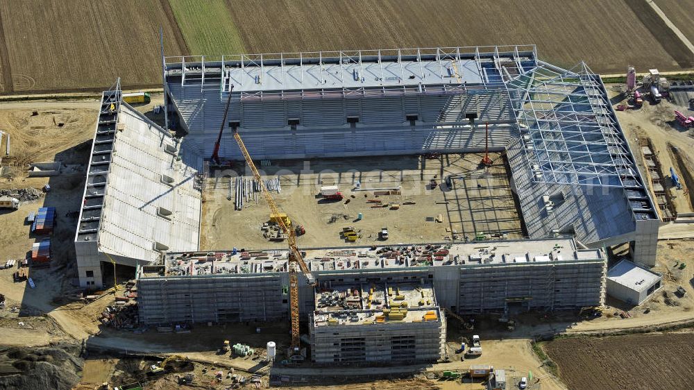 Aerial image Mainz - Blick auf den Neubau der Coface Arena im Stadtteil Bretzenheim. Das neue Stadion des Fußballklubs FSV Mainz 05 soll 33.500 Plätze bieten und zu Beginn des Jahres 2011 fertiggestellt werden. Bauherr und Eigentümer ist die Grundstücksverwaltungsgesellschaft (GVG) der Stadt Mainz. Ausführende Baufirma ist die BAM Deutschland AG. View of the new Coface Arena in the district Bretzenheim. The new stadium of the football club FSV Mainz 05 will provide 33,500 seats and will be completed at the beginning of 2011. Builder and owner of the property is the real estate management society of the city of Mainz (GVG).