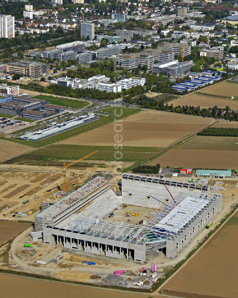 Aerial photograph Mainz - Blick auf den Neubau der Coface Arena im Stadtteil Bretzenheim. Das neue Stadion des Fußballklubs FSV Mainz 05 soll 33.500 Plätze bieten und zu Beginn des Jahres 2011 fertiggestellt werden. Bauherr und Eigentümer ist die Grundstücksverwaltungsgesellschaft (GVG) der Stadt Mainz. Ausführende Baufirma ist die BAM Deutschland AG. View of the new Coface Arena in the district Bretzenheim. The new stadium of the football club FSV Mainz 05 will provide 33,500 seats and will be completed at the beginning of 2011. Builder and owner of the property is the real estate management society of the city of Mainz (GVG).